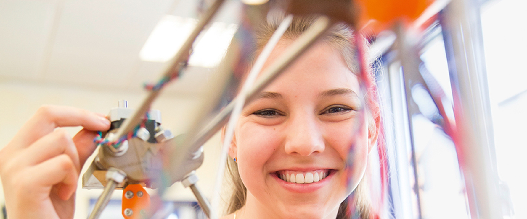 female pupil with 3D printer